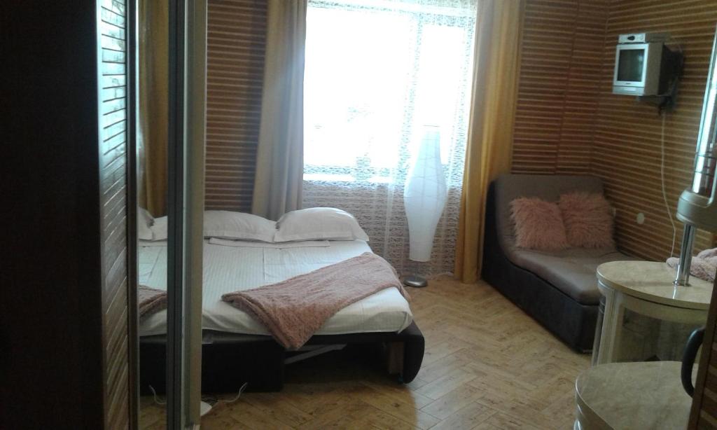Postel nebo postele na pokoji v ubytování Апартаменты-студио