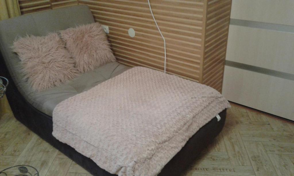 Postel nebo postele na pokoji v ubytování Апартаменты-студио