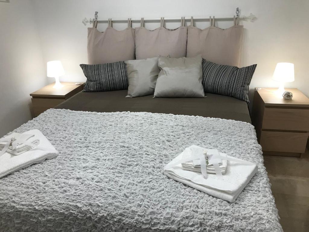 Postel nebo postele na pokoji v ubytování Cappuccini Green Relax