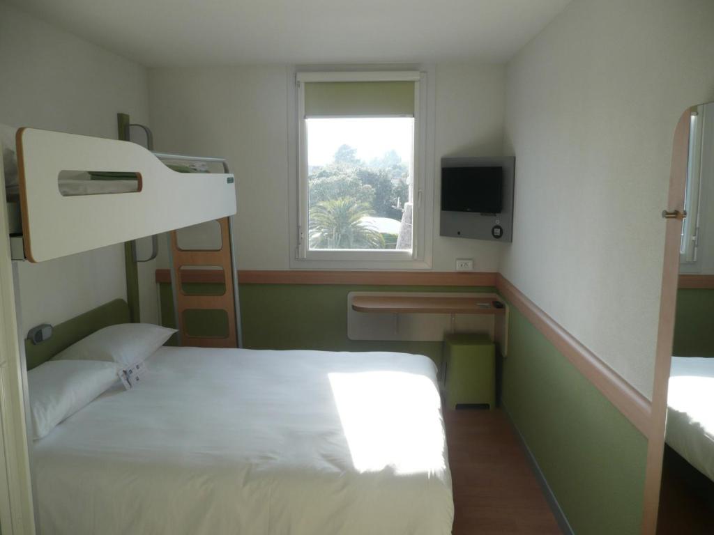 Postel nebo postele na pokoji v ubytování ibis budget Ajaccio