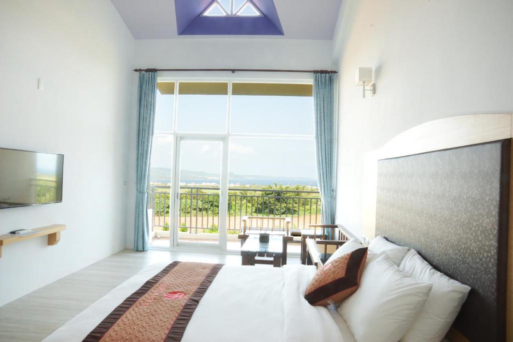 Postelja oz. postelje v sobi nastanitve Coral B&B