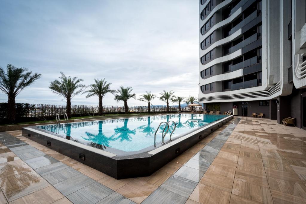 Bazén v ubytování Cuncyue Hot Spring Resort nebo v jeho okolí