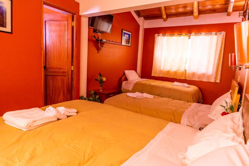 Postel nebo postele na pokoji v ubytování Peru Quechua's Lodge Ollantaytambo