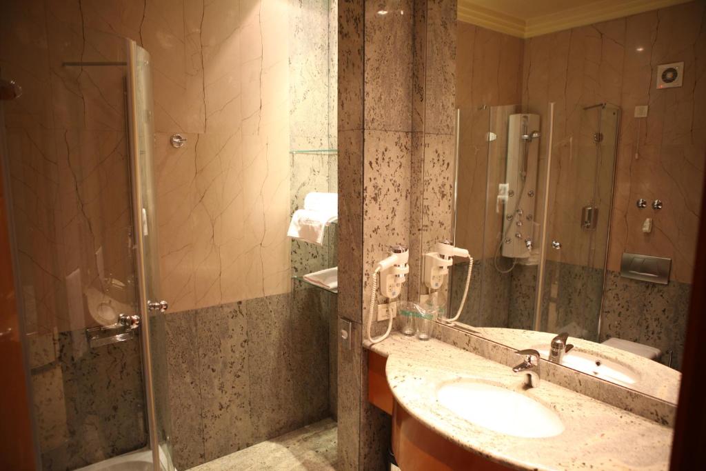 Koupelna v ubytování Garni Hotel Aleksandar