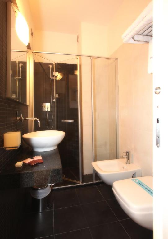 Koupelna v ubytování Hotel Santiago