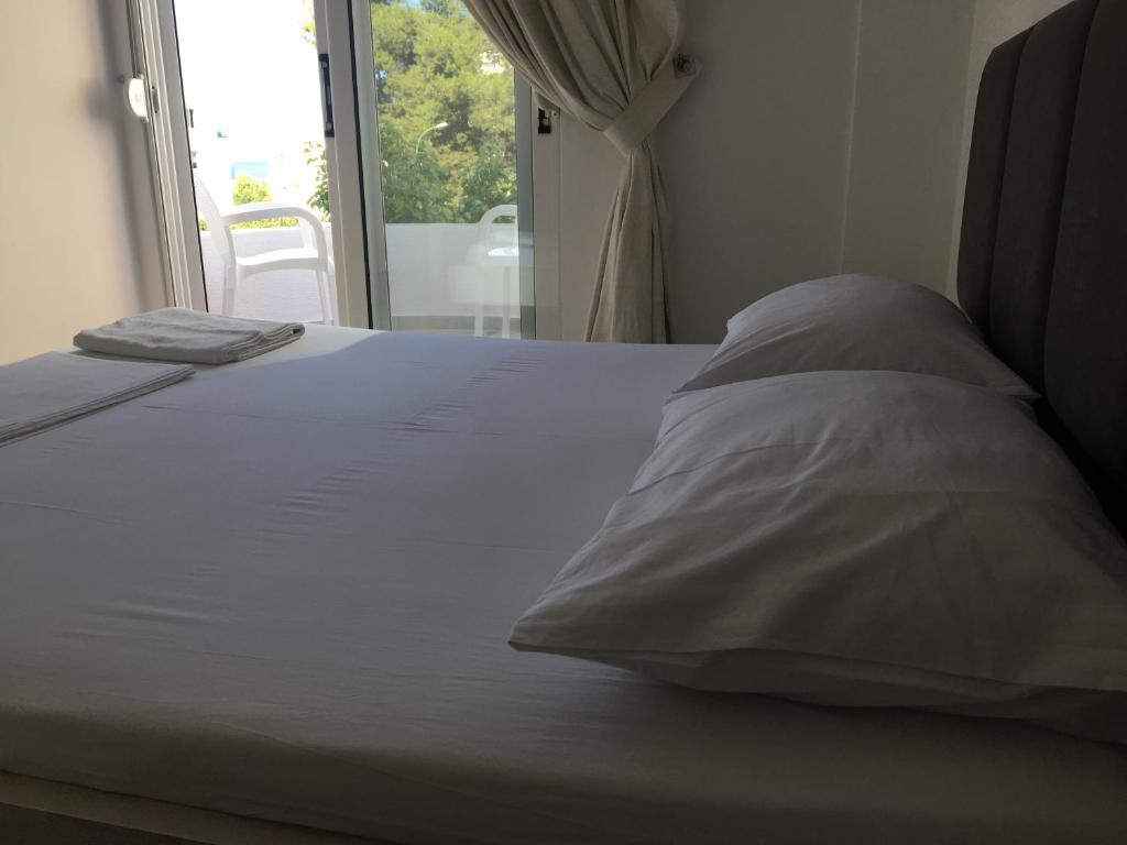 Letto o letti in una camera di Villa Orkidea