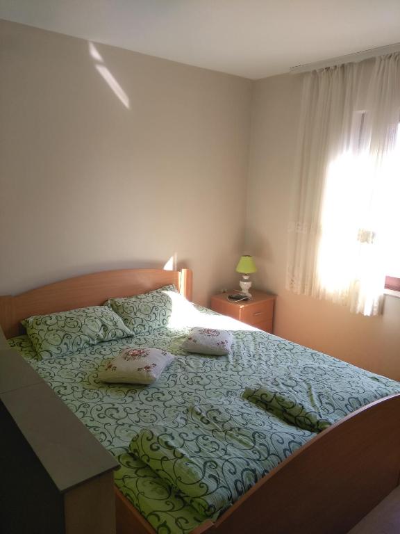 Postel nebo postele na pokoji v ubytování Studio Milojević Sokobanja