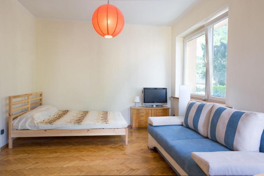 Postel nebo postele na pokoji v ubytování NavyBlue Apartments