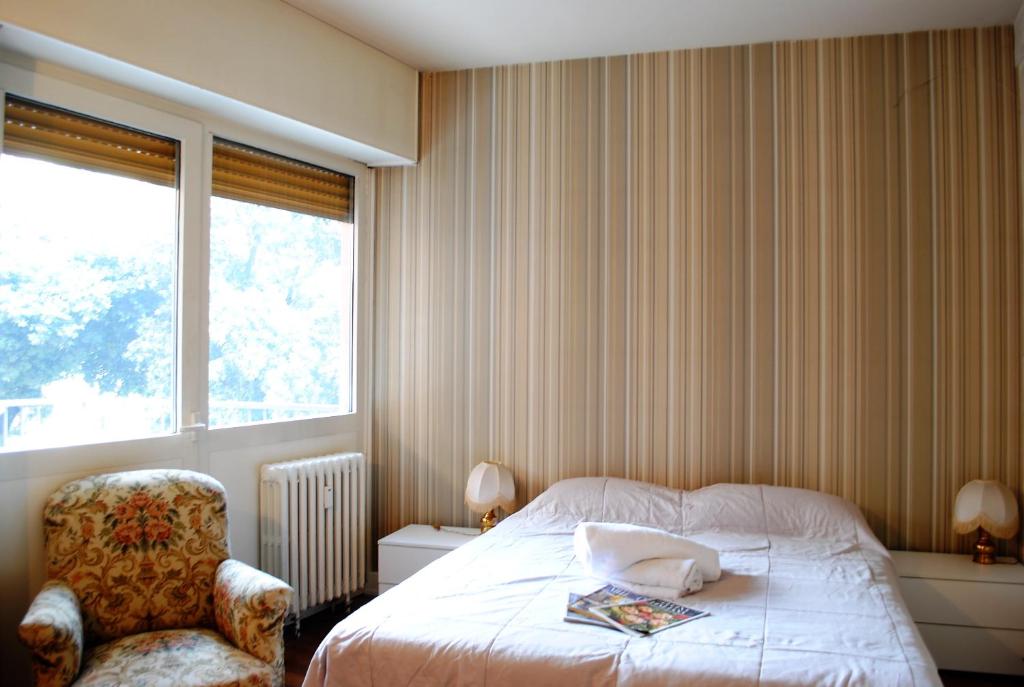 Posteľ alebo postele v izbe v ubytovaní Dreaming Piazza Bra Rooms