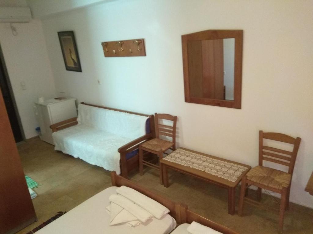 Postel nebo postele na pokoji v ubytování Panorama Palaiοpolis
