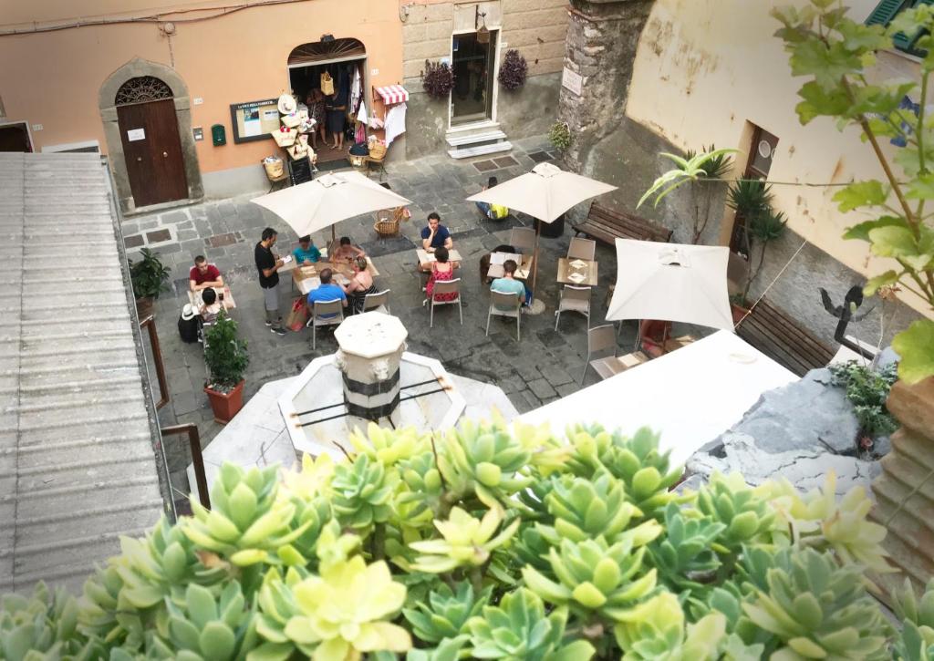 Posezení v ubytování Colonna 24 Luxury Room in Portovenere near 5 Terre