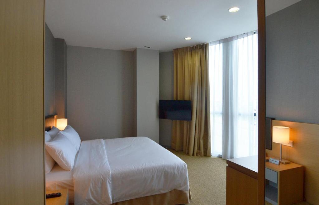 Postel nebo postele na pokoji v ubytování Hotel N°5