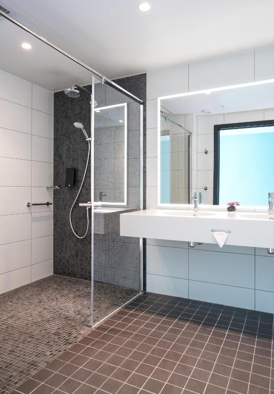 Koupelna v ubytování Thon Hotel Storo