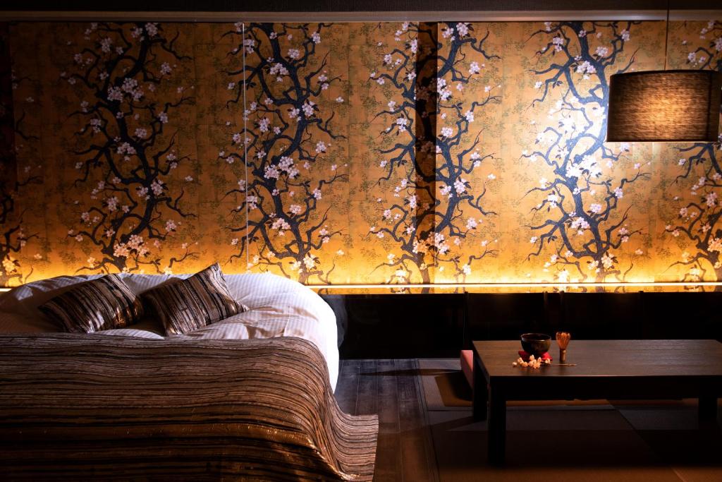Postel nebo postele na pokoji v ubytování HOTEL Mai Sakura ADULT ONLY
