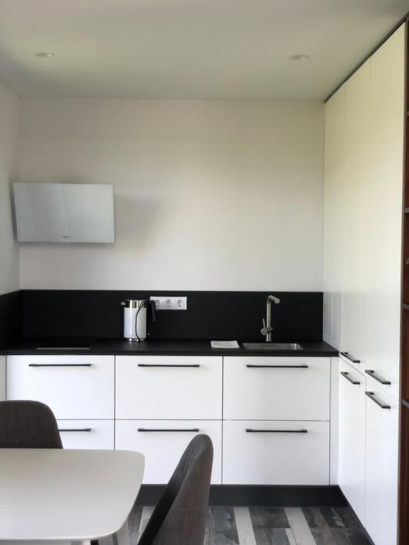 Kuchyň nebo kuchyňský kout v ubytování Utriai Guest Place