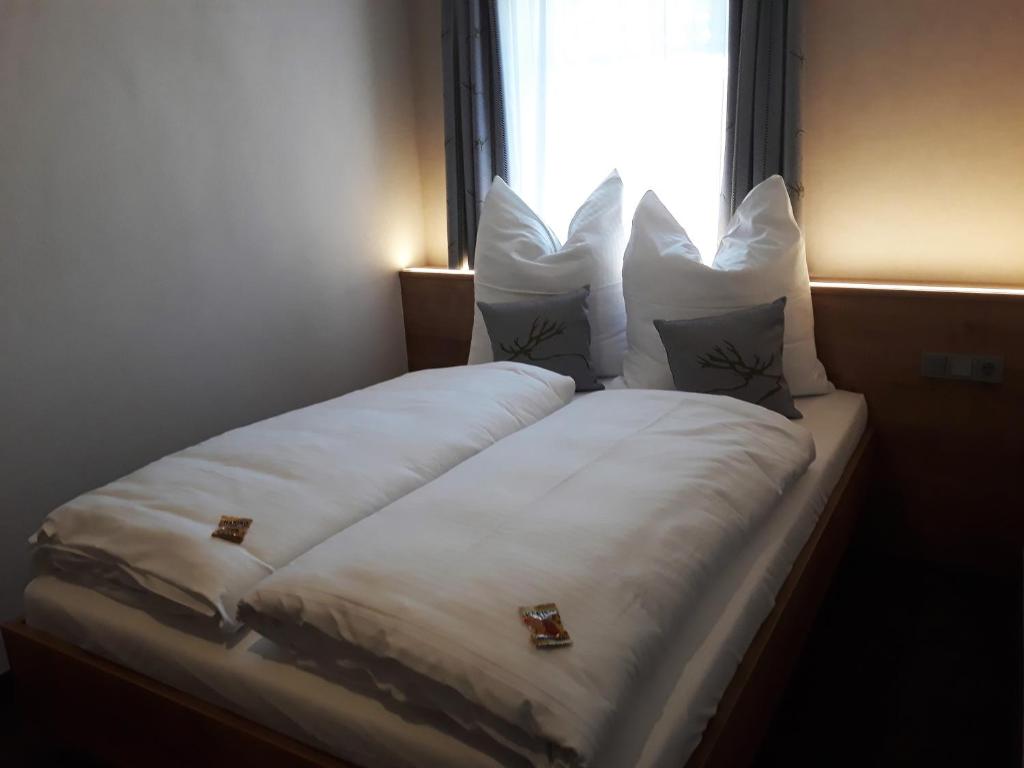 Postel nebo postele na pokoji v ubytování Gästehaus - Kretschmannshof