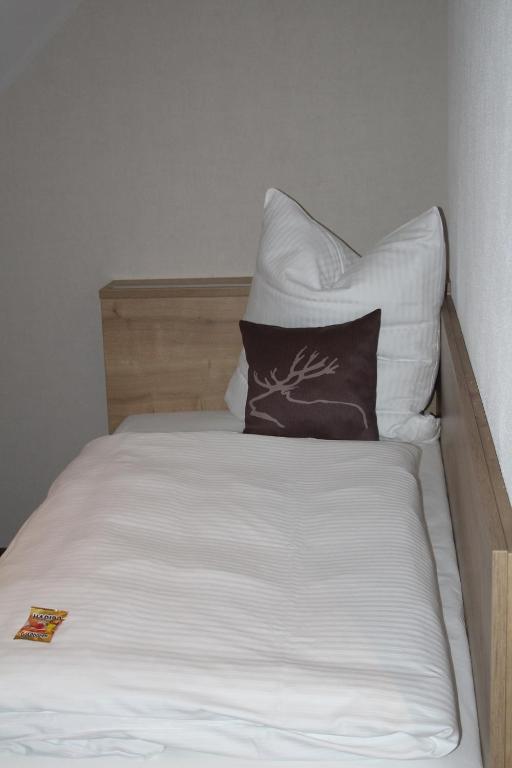 Postel nebo postele na pokoji v ubytování Gästehaus - Kretschmannshof