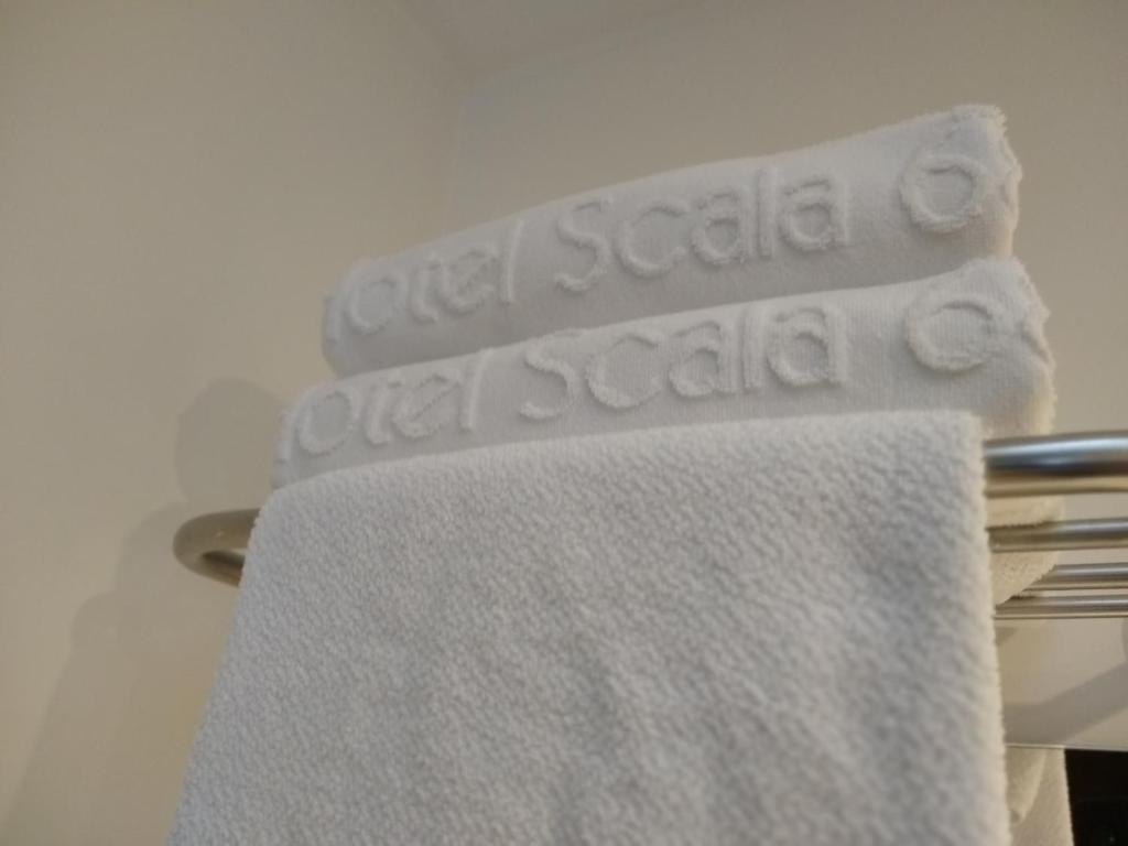 a towel on a towel rack next to a towel at Scala 68 in Bogotá