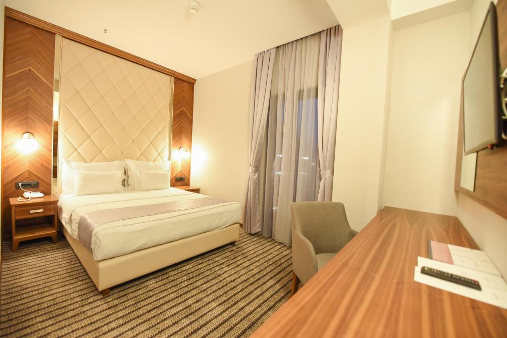 Postel nebo postele na pokoji v ubytování Hotel Union