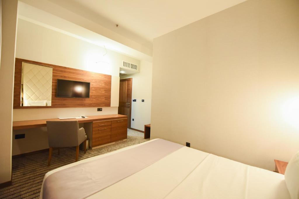Postel nebo postele na pokoji v ubytování Hotel Union