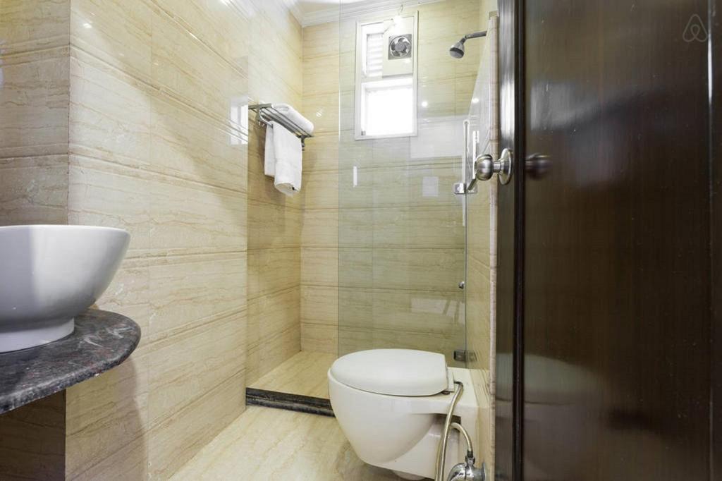 Koupelna v ubytování Amax Inn
