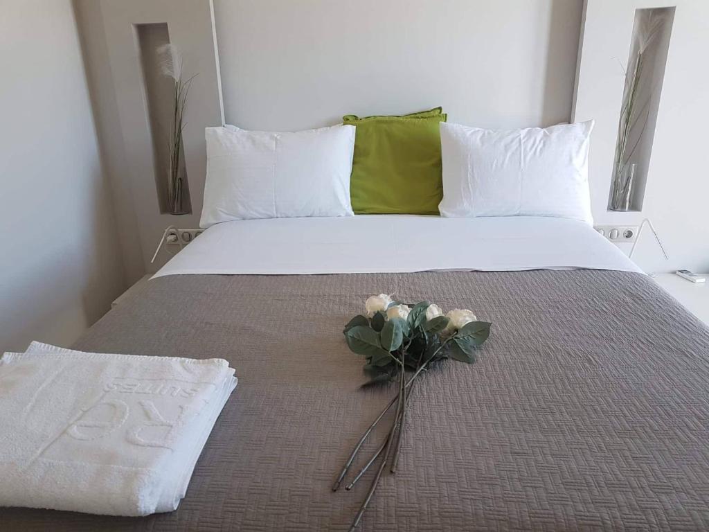 Postel nebo postele na pokoji v ubytování Core Luxury Suites