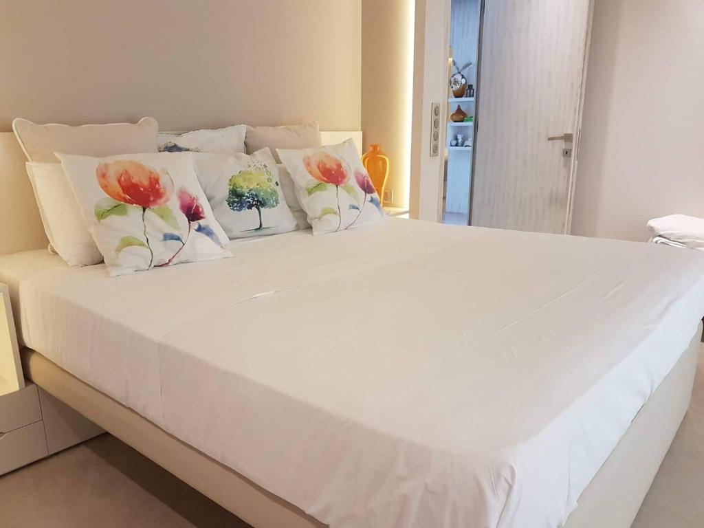 Postel nebo postele na pokoji v ubytování Core Luxury Suites