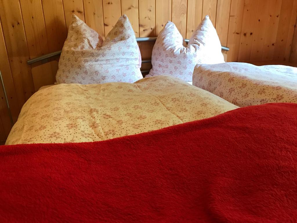 Postel nebo postele na pokoji v ubytování Berghaus Außergschlöß