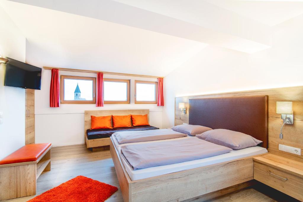 Postel nebo postele na pokoji v ubytování Hotel Sonnenheim
