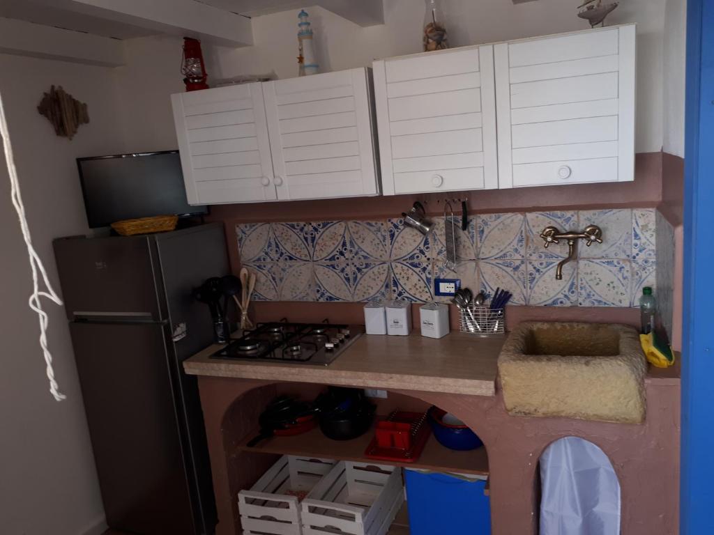 Kuchnia lub aneks kuchenny w obiekcie Casetta Dei Pescatori