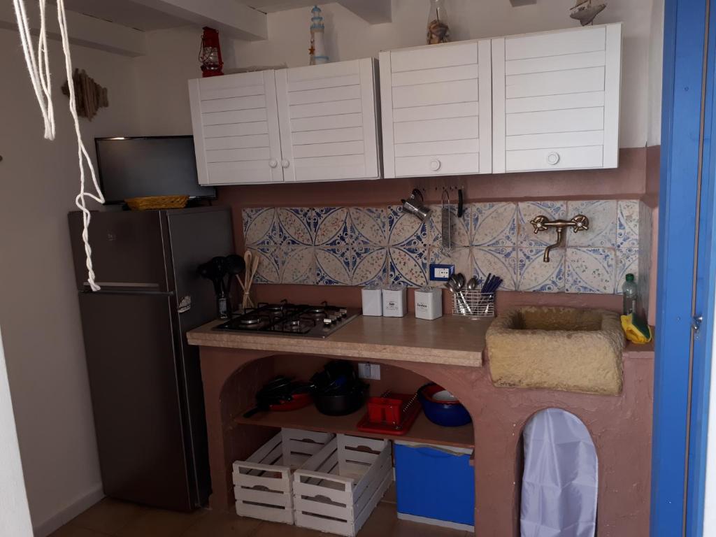 Kuchnia lub aneks kuchenny w obiekcie Casetta Dei Pescatori