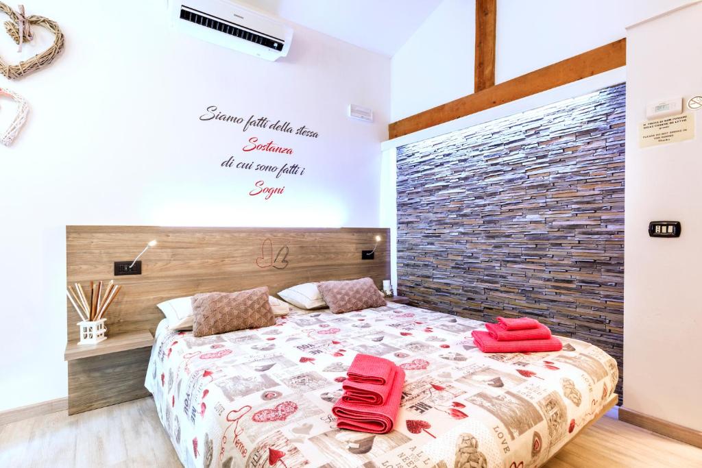 Posteľ alebo postele v izbe v ubytovaní B&B Valtellina Mon Amour