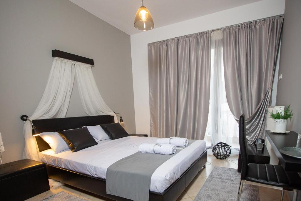 A bed or beds in a room at Villa Deluxe Sight