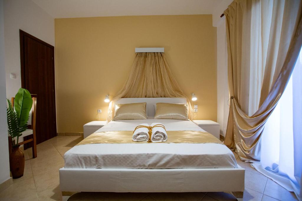 A bed or beds in a room at Villa Deluxe Sight