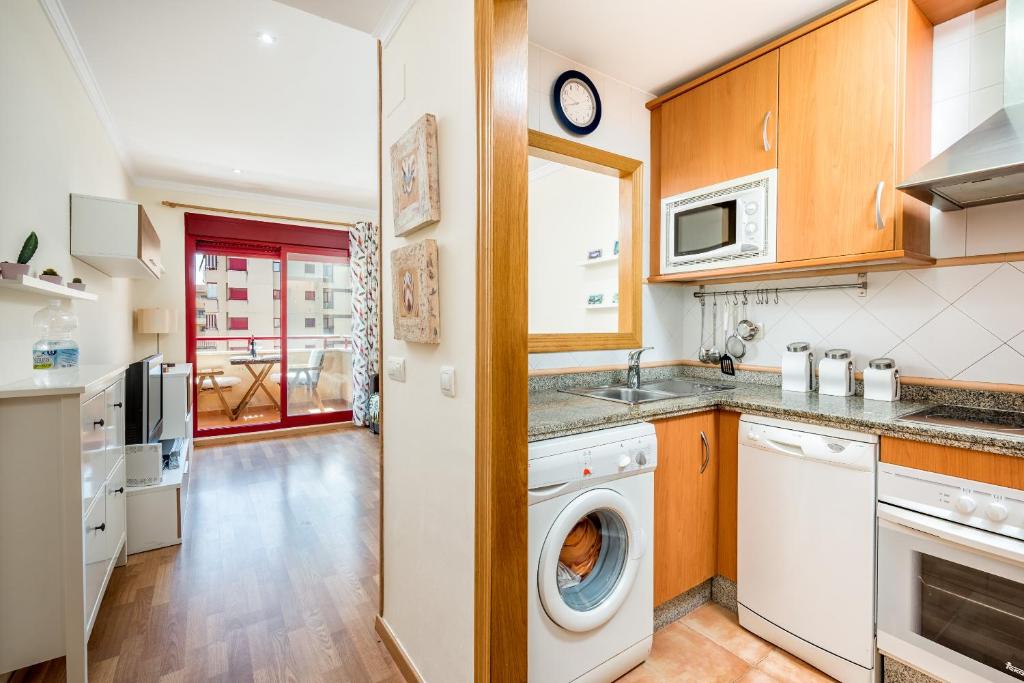 Kuchyňa alebo kuchynka v ubytovaní Apartamento Parque litoral