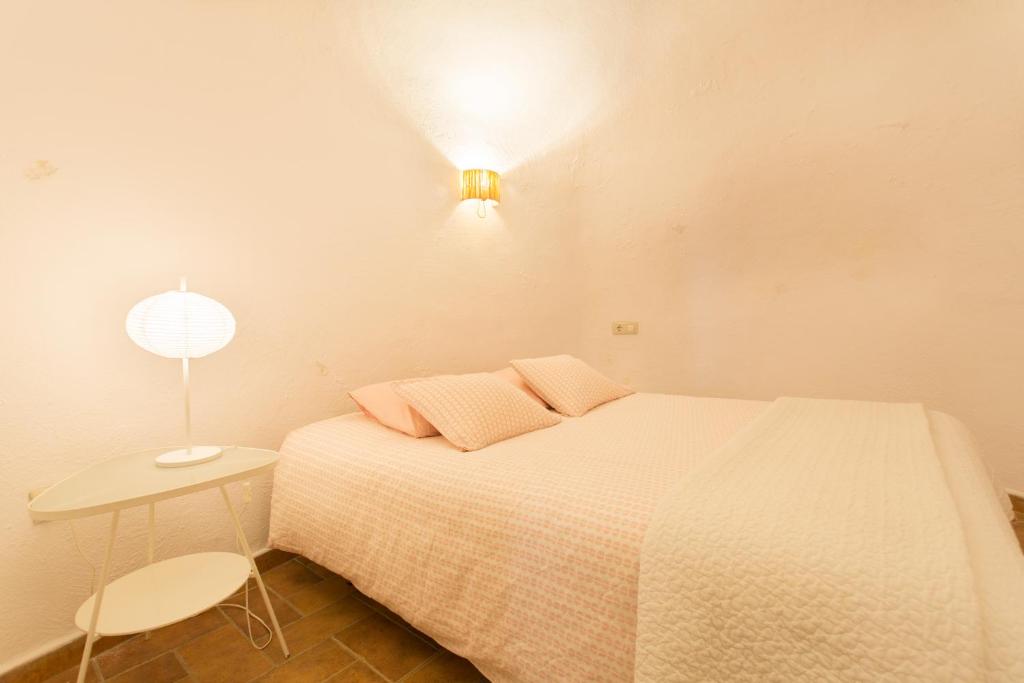 Cama o camas de una habitación en Montes Claros 26