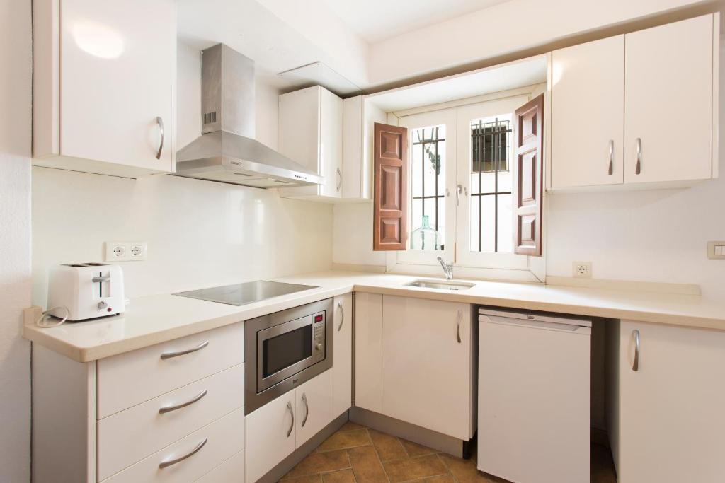 Una cocina o zona de cocina en Montes Claros 26