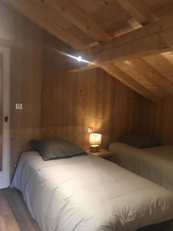 Postel nebo postele na pokoji v ubytování Chalet La R'Batte