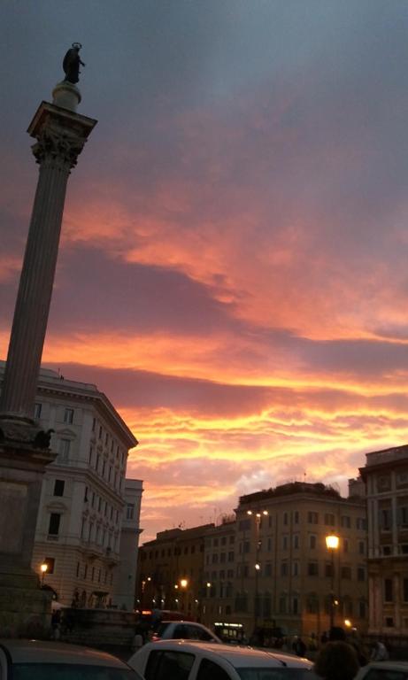 The sunrise or sunset as seen from a panziókat or nearby