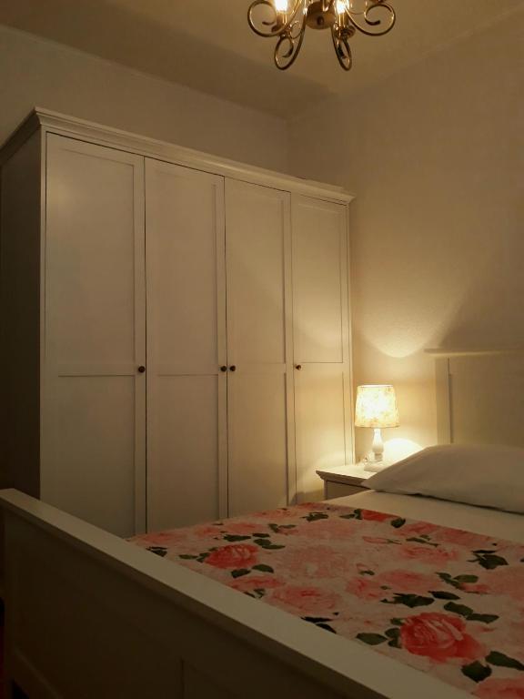 Postel nebo postele na pokoji v ubytování Apartments Vrisak
