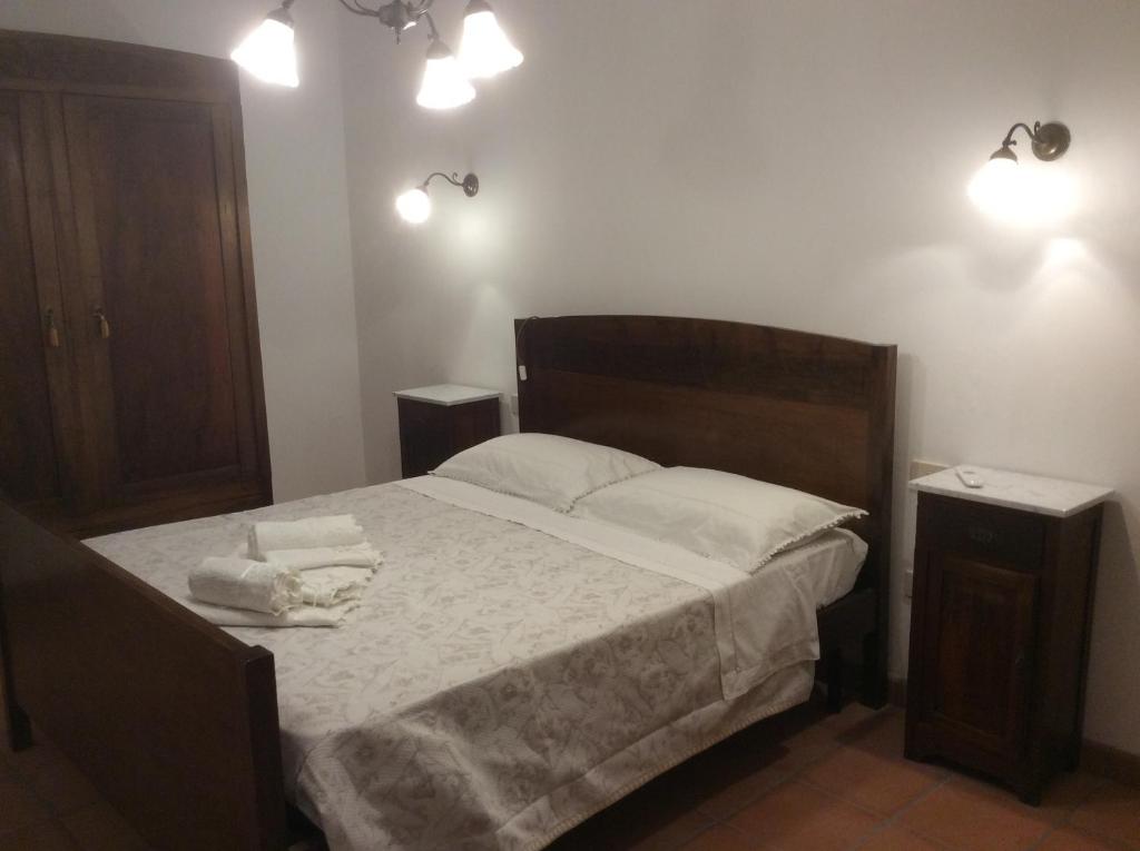 Postel nebo postele na pokoji v ubytování Le Apuane Holidays