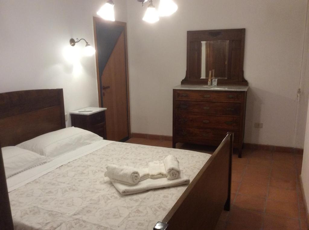 Postel nebo postele na pokoji v ubytování Le Apuane Holidays