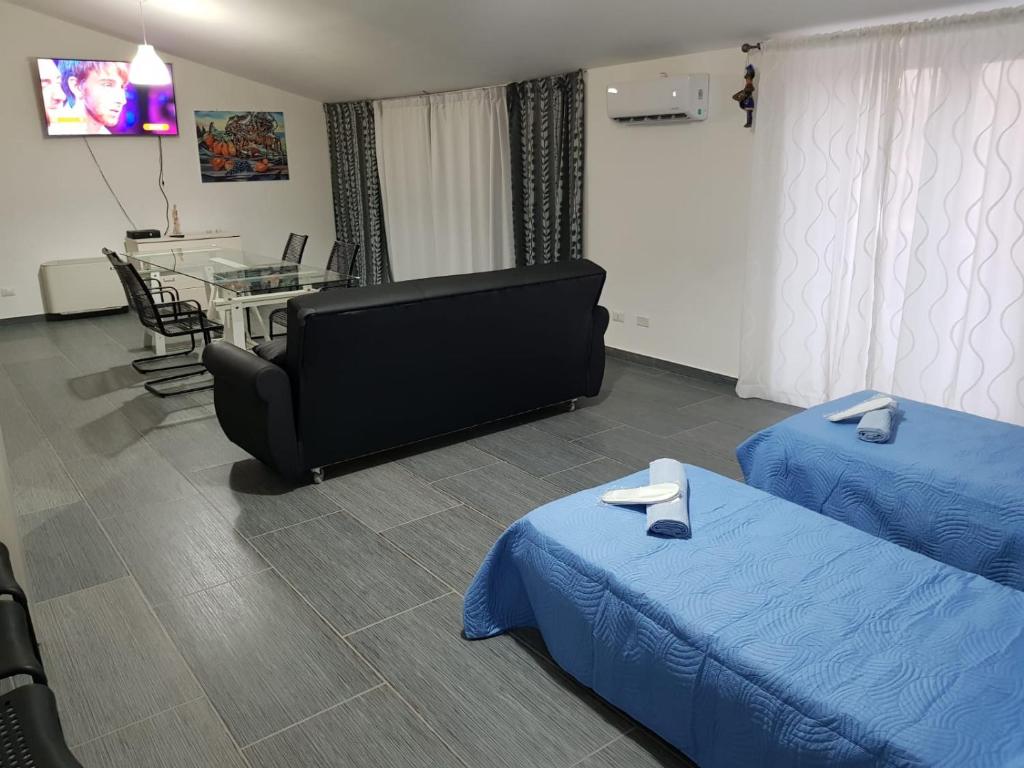 A bed or beds in a room at Lilium In B&B