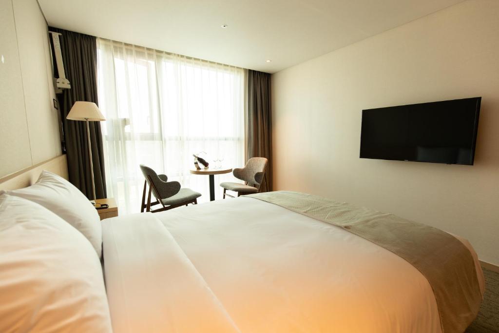 TV a/nebo společenská místnost v ubytování Hotel Winstory