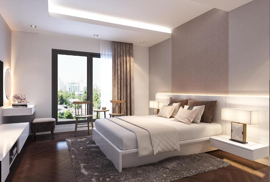 Giường trong phòng chung tại HA NOI HOTEL near Tan Son Nhat Airport --- FREE Airport Pick-Up and Drop-Off Available 24 Hours a Day