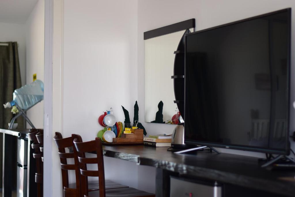TV a/nebo společenská místnost v ubytování the beachhouse