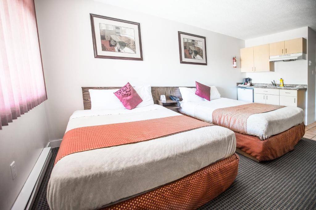Postel nebo postele na pokoji v ubytování Grandview Motel