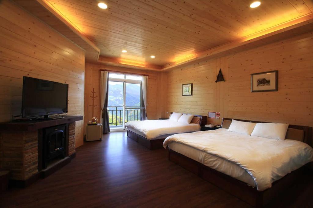 Postel nebo postele na pokoji v ubytování Yun Meng Xianjing Homestay