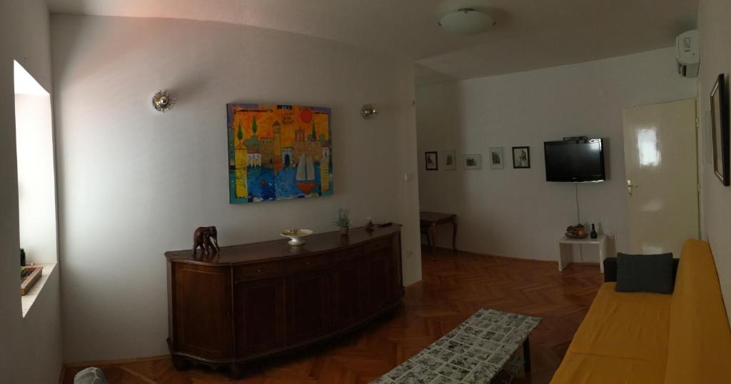 TV a/nebo společenská místnost v ubytování Flat Sweet Dream