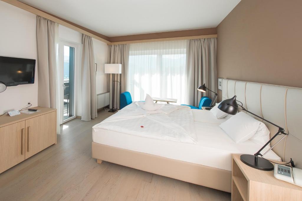Postel nebo postele na pokoji v ubytování Seeberg Garni Hotel